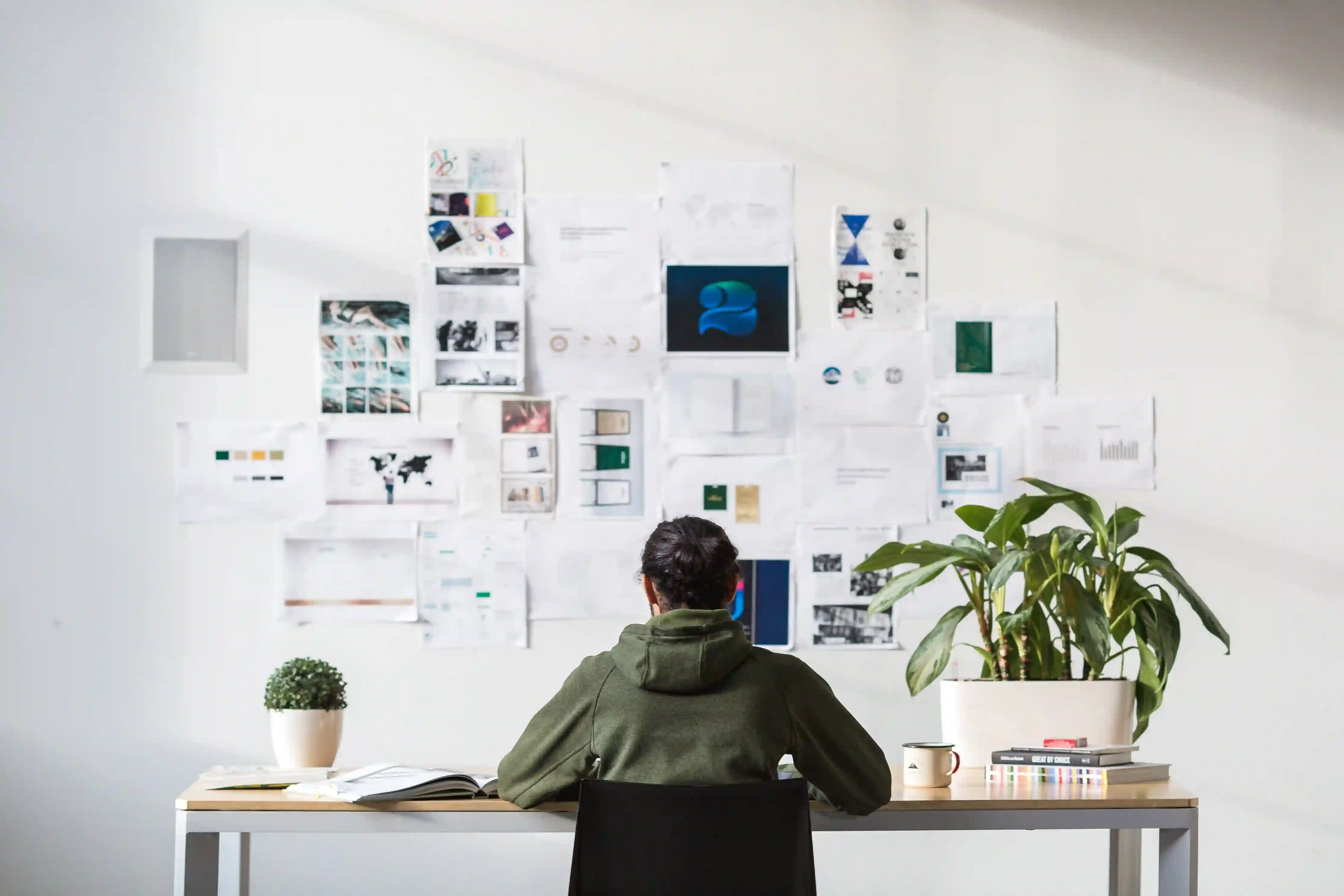 Man creatively working at desk
